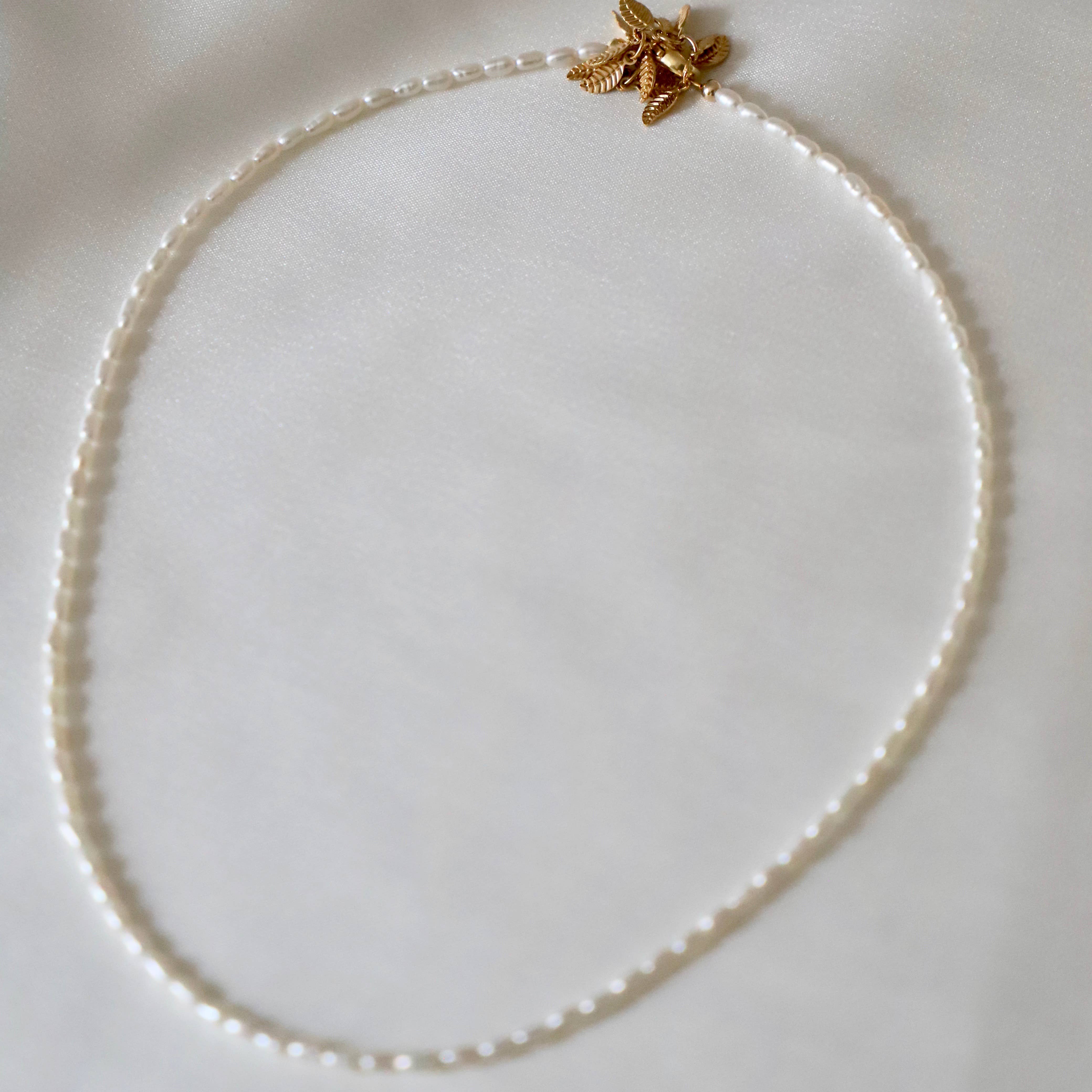 Mini hot sale pearl necklace